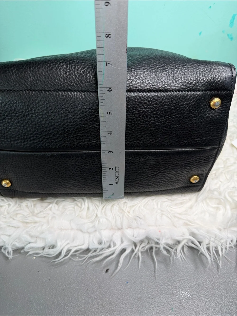 Authentic Prada Black  Leather Satchel with Gold Logo .